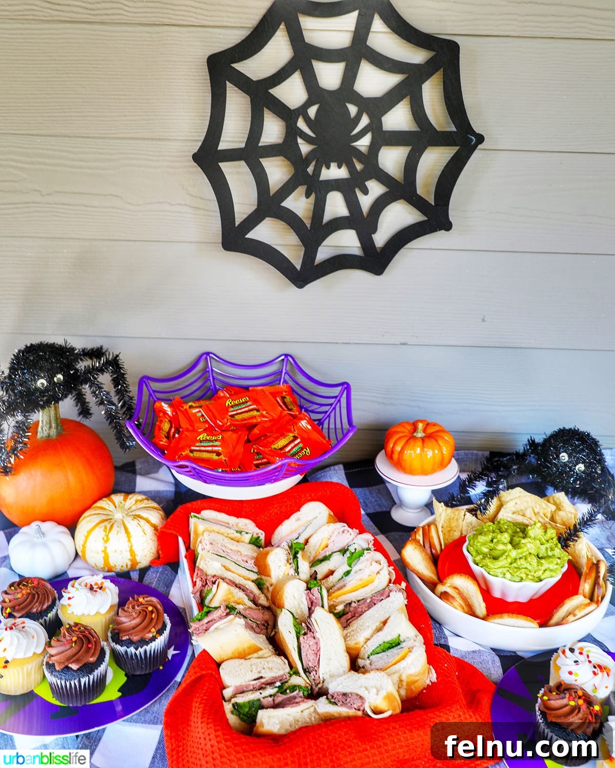 17 Spooktacularly Healthy No-Bake Halloween Treats 4 A beautifully decorated Halloween table setting with various treats and decorations.