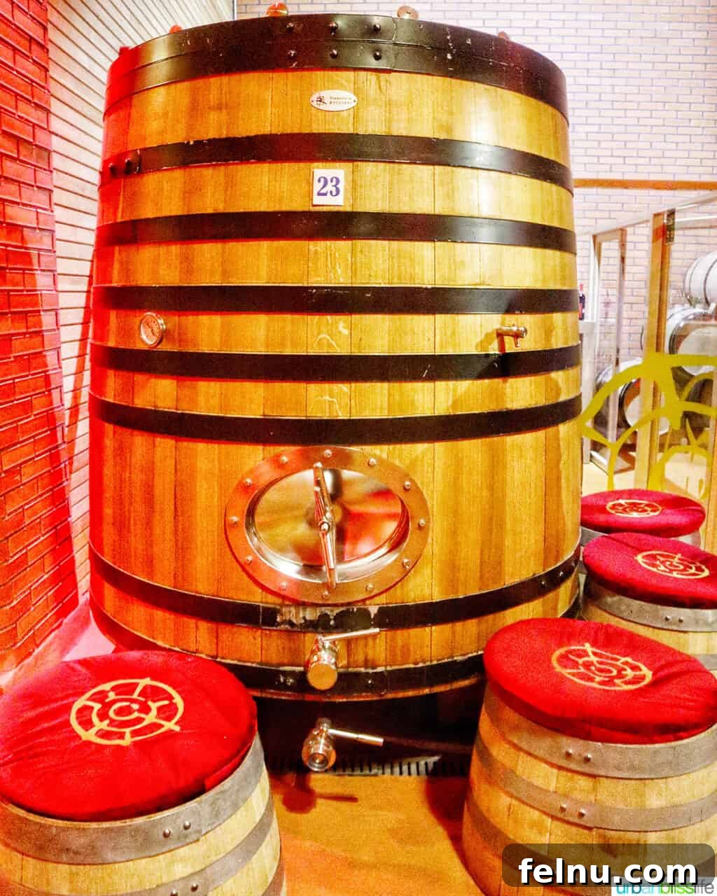 Kazakhstan Wine: A Journey Through Time and Taste 11 Large wine barrel with wine barrel seating at Arba winery in Kazakhstan.