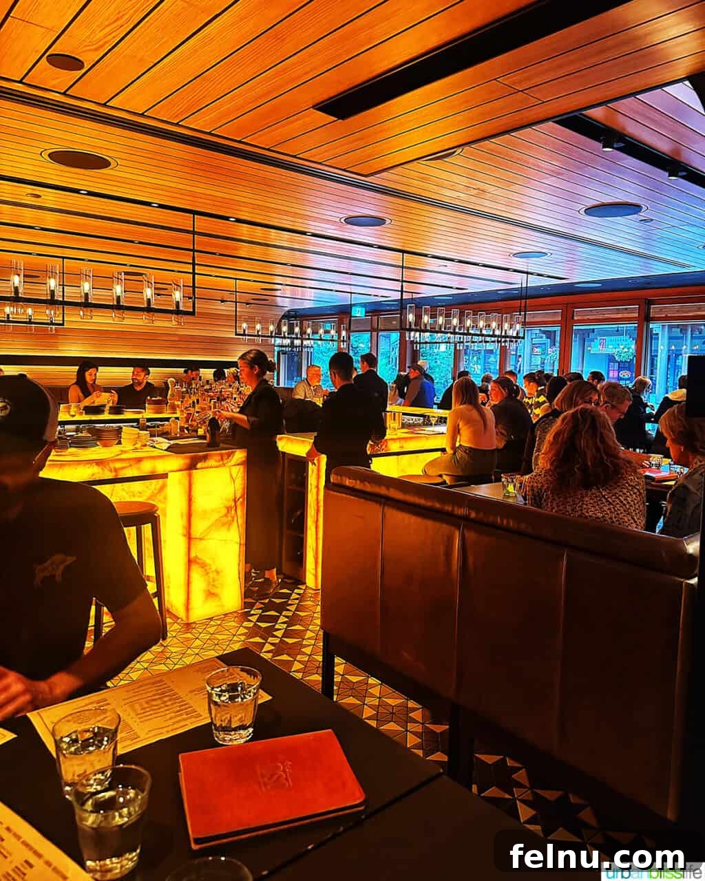 Bustling bar and dining area at Bar Oso.