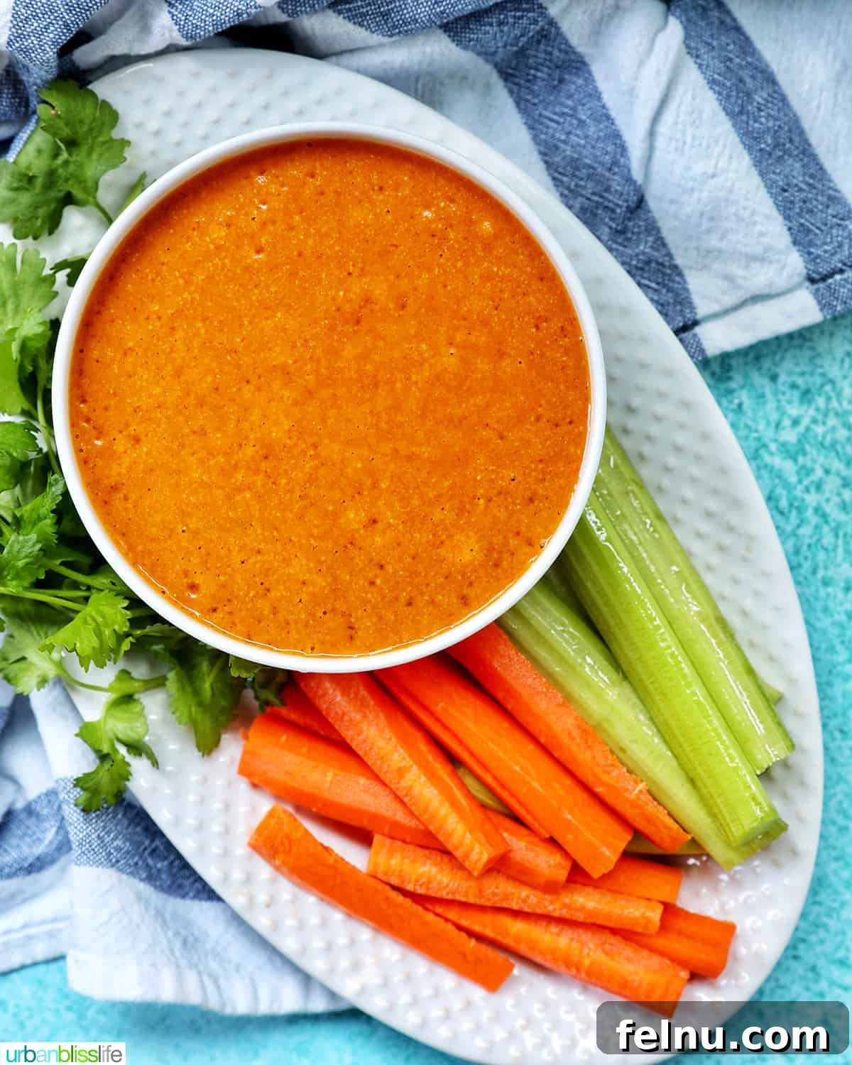 Overhead view of vegan buffalo sauce with vegetables
