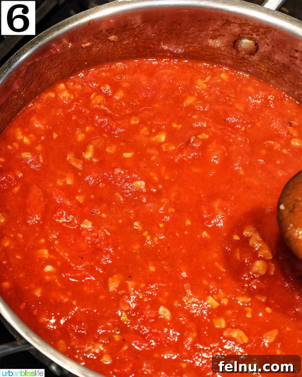 Creamy Dreamy Rigatoni: A Vodka Sauce Delight 11 Simmering the tomato sauce