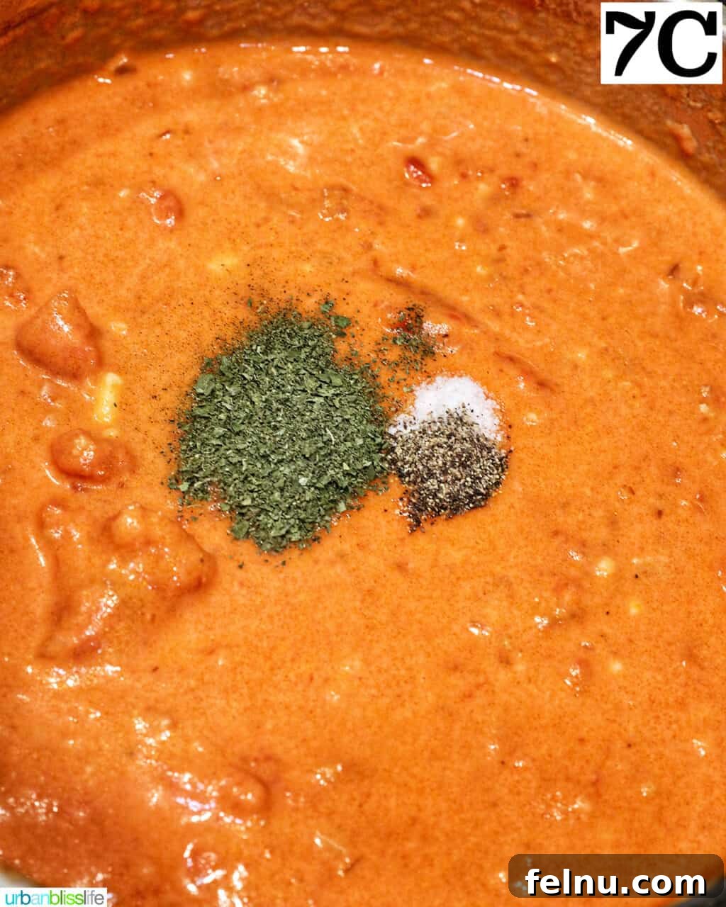 Creamy Dreamy Rigatoni: A Vodka Sauce Delight 14 Adding herbs to the sauce
