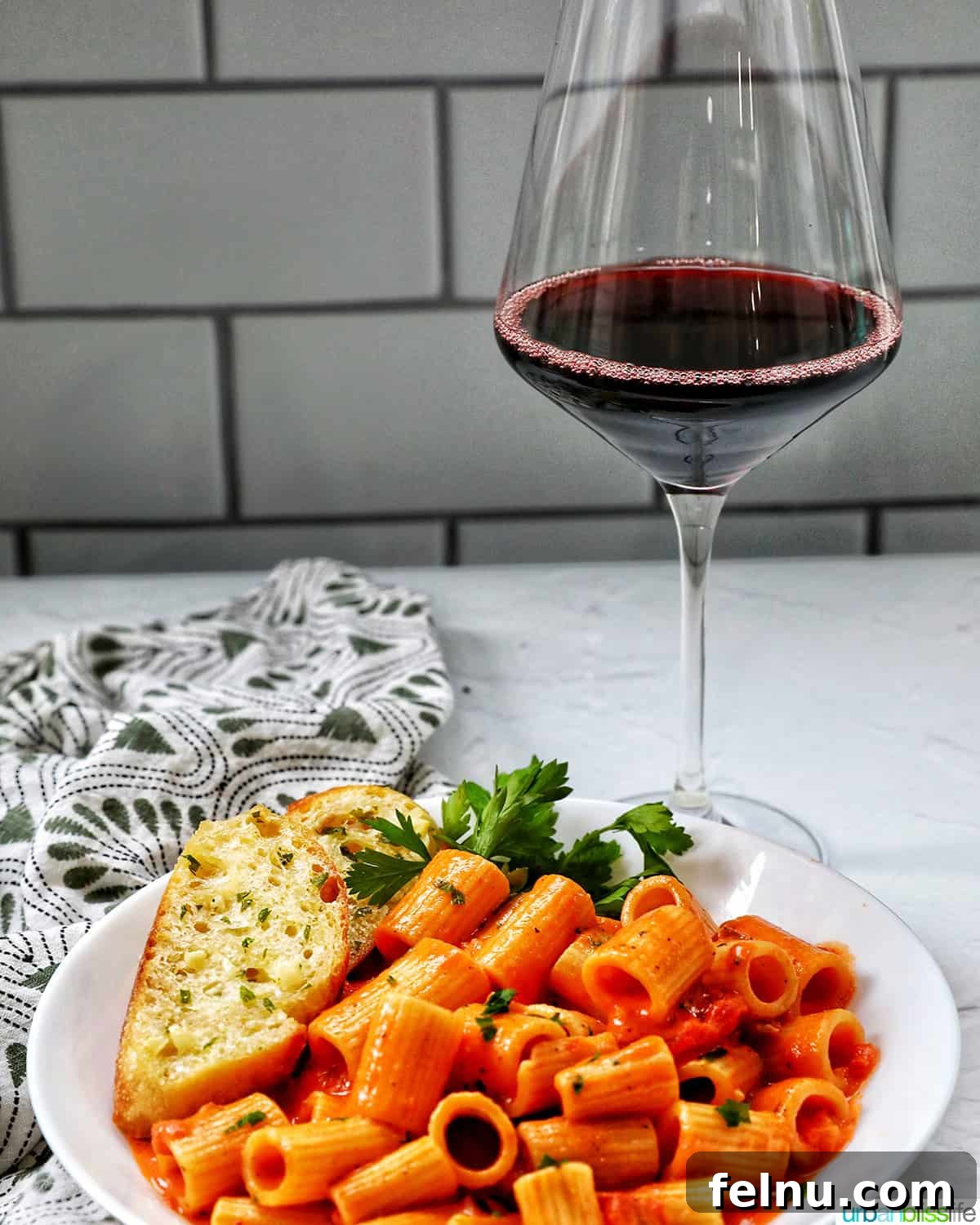Creamy Dreamy Rigatoni: A Vodka Sauce Delight 17 Rigatoni with Vodka Sauce served with red wine