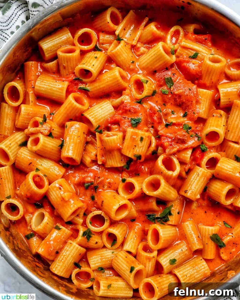 Creamy Dreamy Rigatoni: A Vodka Sauce Delight 20 Saucepan with rigatoni with vodka sauce