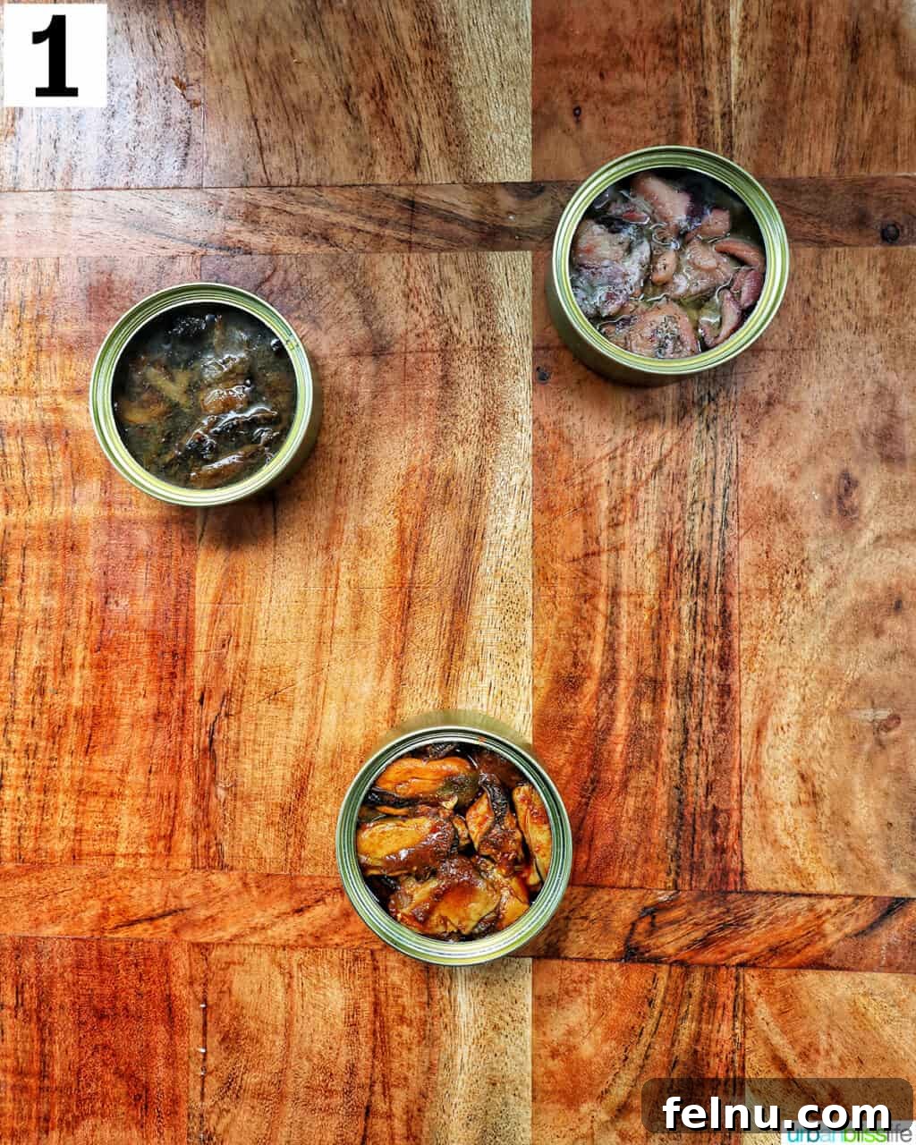 Step 1: Placing tinned fish on the seacuterie board.