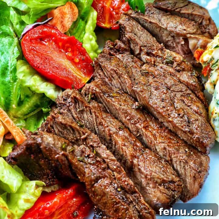 Air Fryer Filet Mignon Perfection 16 filet mignon sliced with salad.