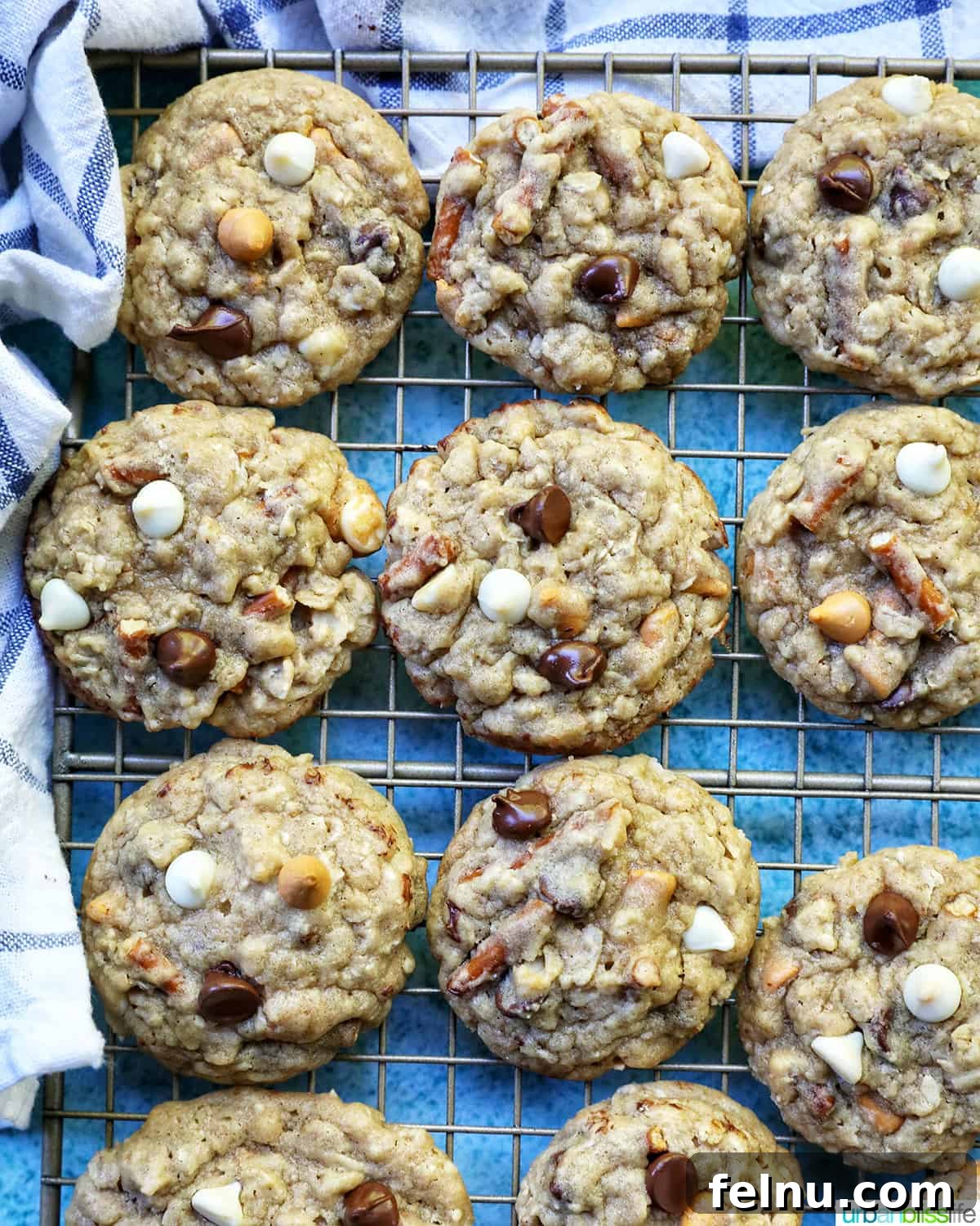 chocolate chip pretzel cookies on a cooling rack.