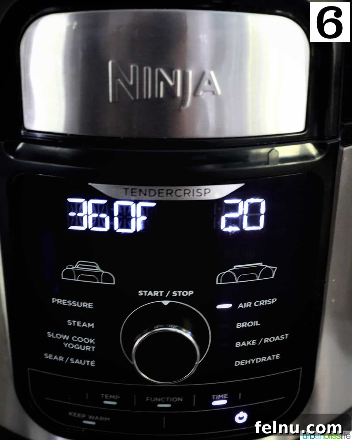 Crispy and Tender Air Fryer Turkey Breast 11 A Ninja air fryer display showing a temperature of 360 degrees Fahrenheit and a cooking time of 20 minutes.