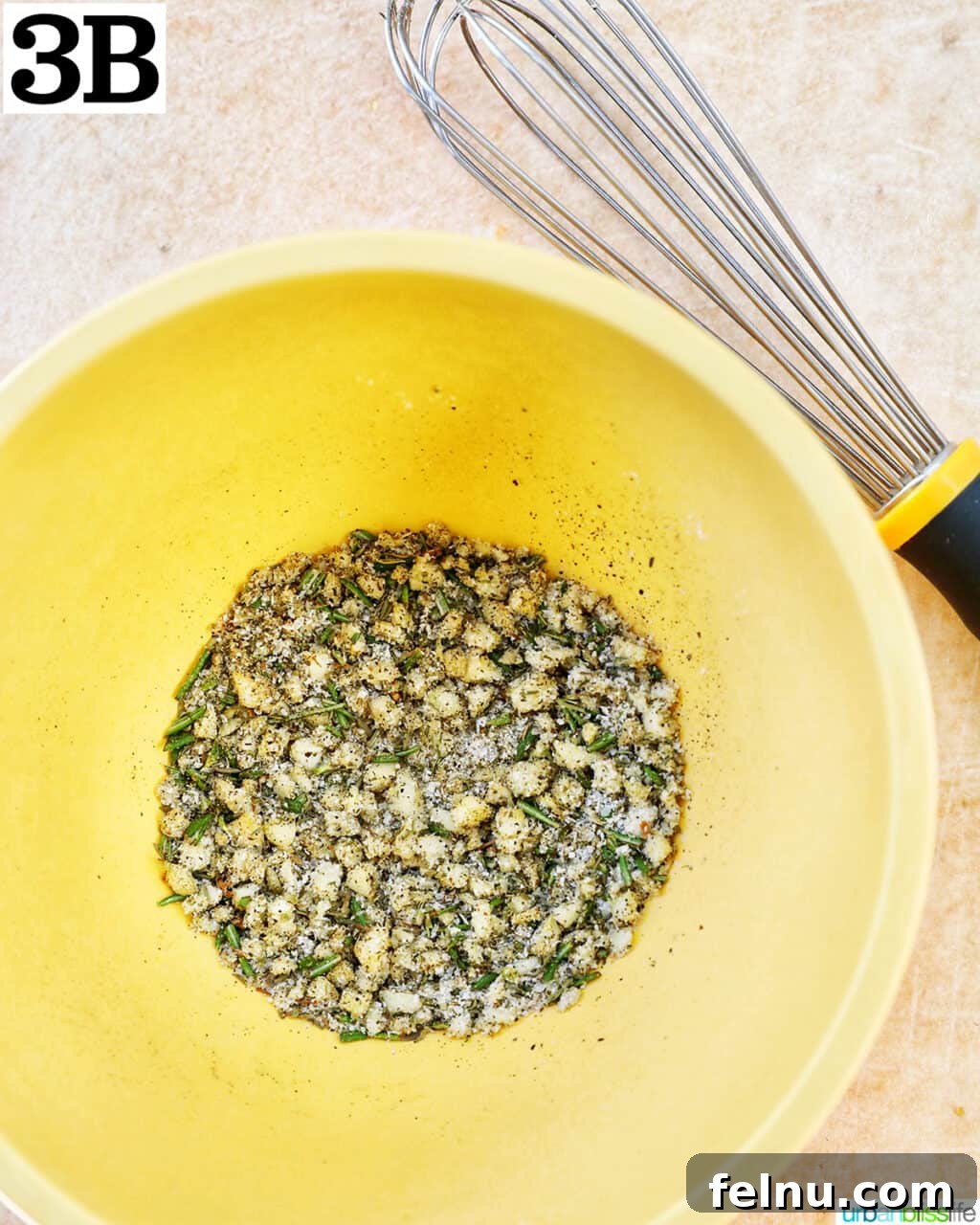 Crispy and Tender Air Fryer Turkey Breast 8 A whisk blending the seasoning mix in a yellow bowl, ensuring even distribution of flavors.