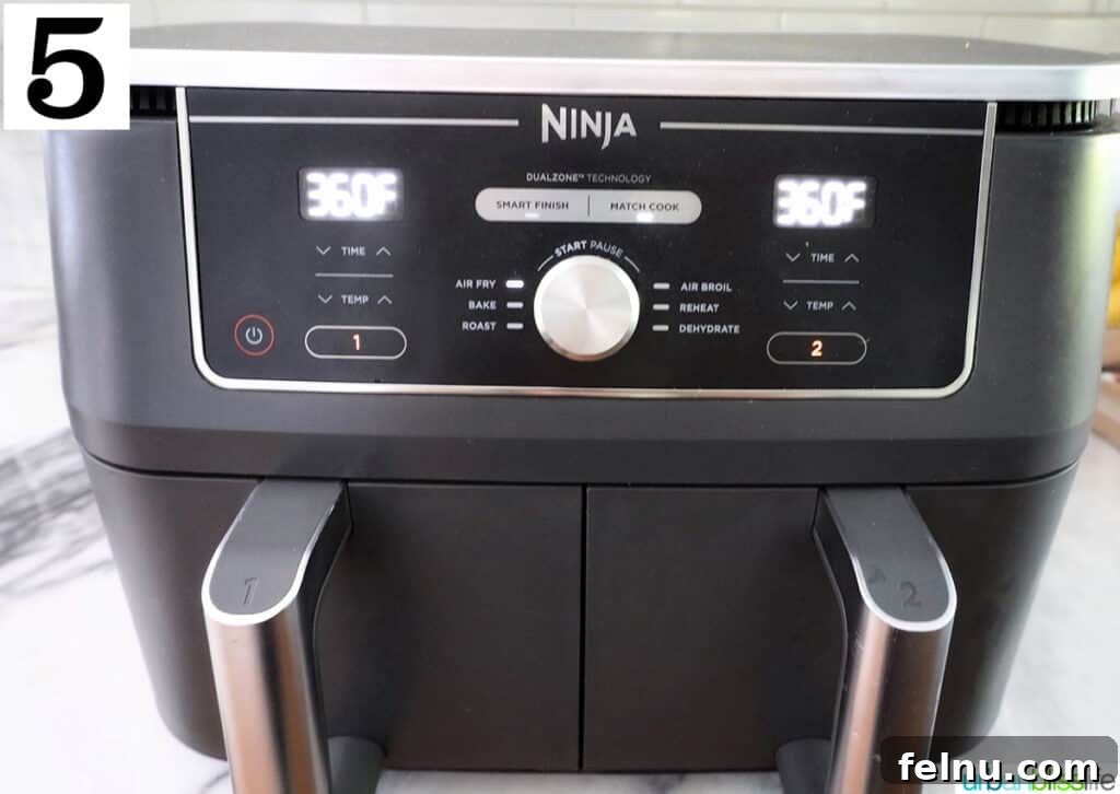 Perfect Air Fryer Turkey Tenderloin 10 Air fryer basket cooking at 360°F.