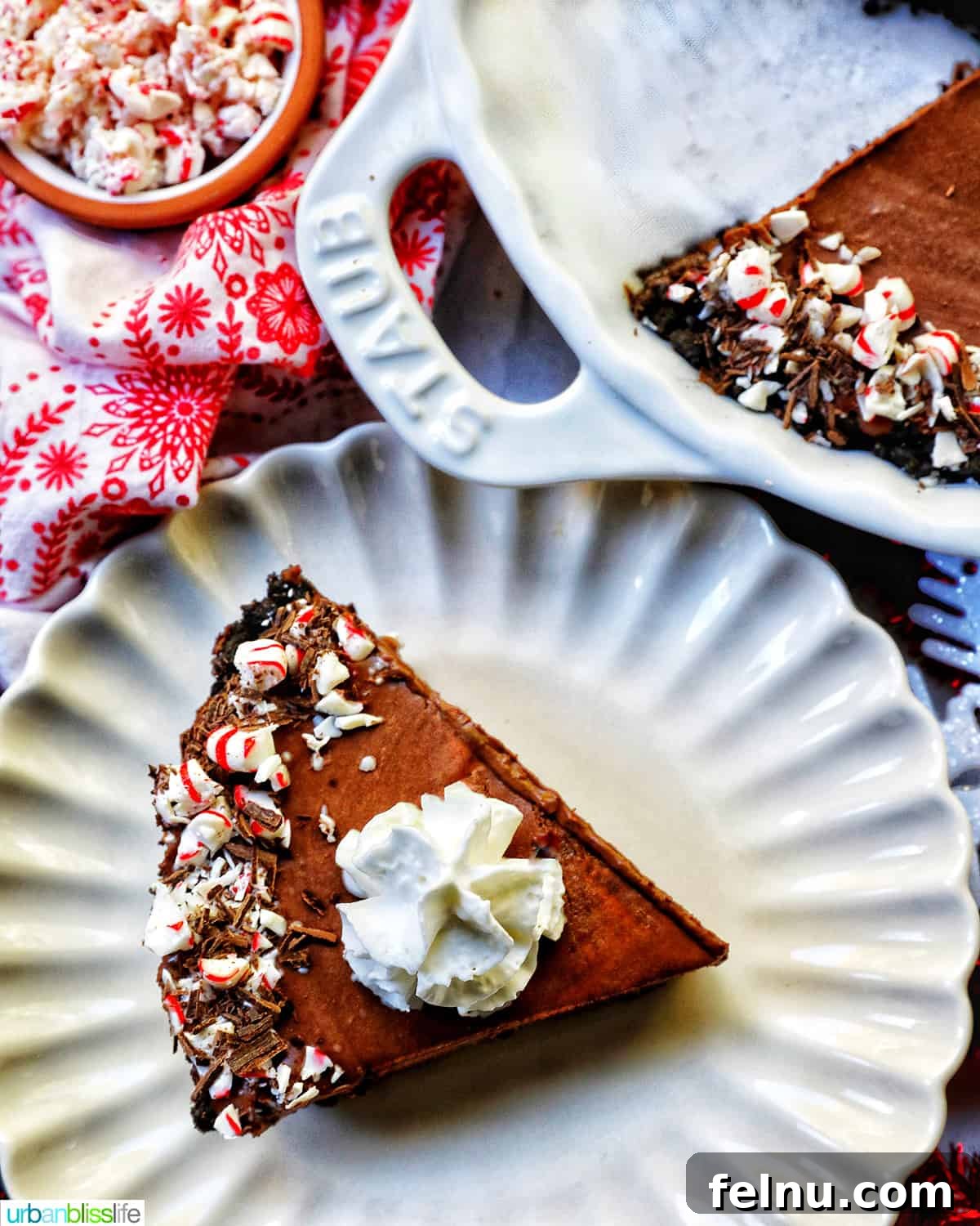 Cool Mint Chocolate Indulgence 2 A delectable slice of Chocolate Peppermint Pie on a scalloped plate, alongside the full pie and a small bowl of festive peppermint candies.