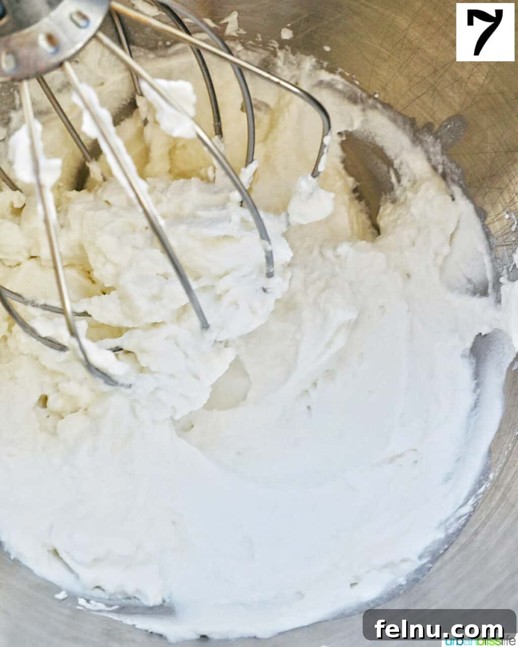 Cool Mint Chocolate Indulgence 11 A stand mixer whisking heavy cream to perfect stiff peaks, essential for the light and airy chocolate peppermint pie filling.
