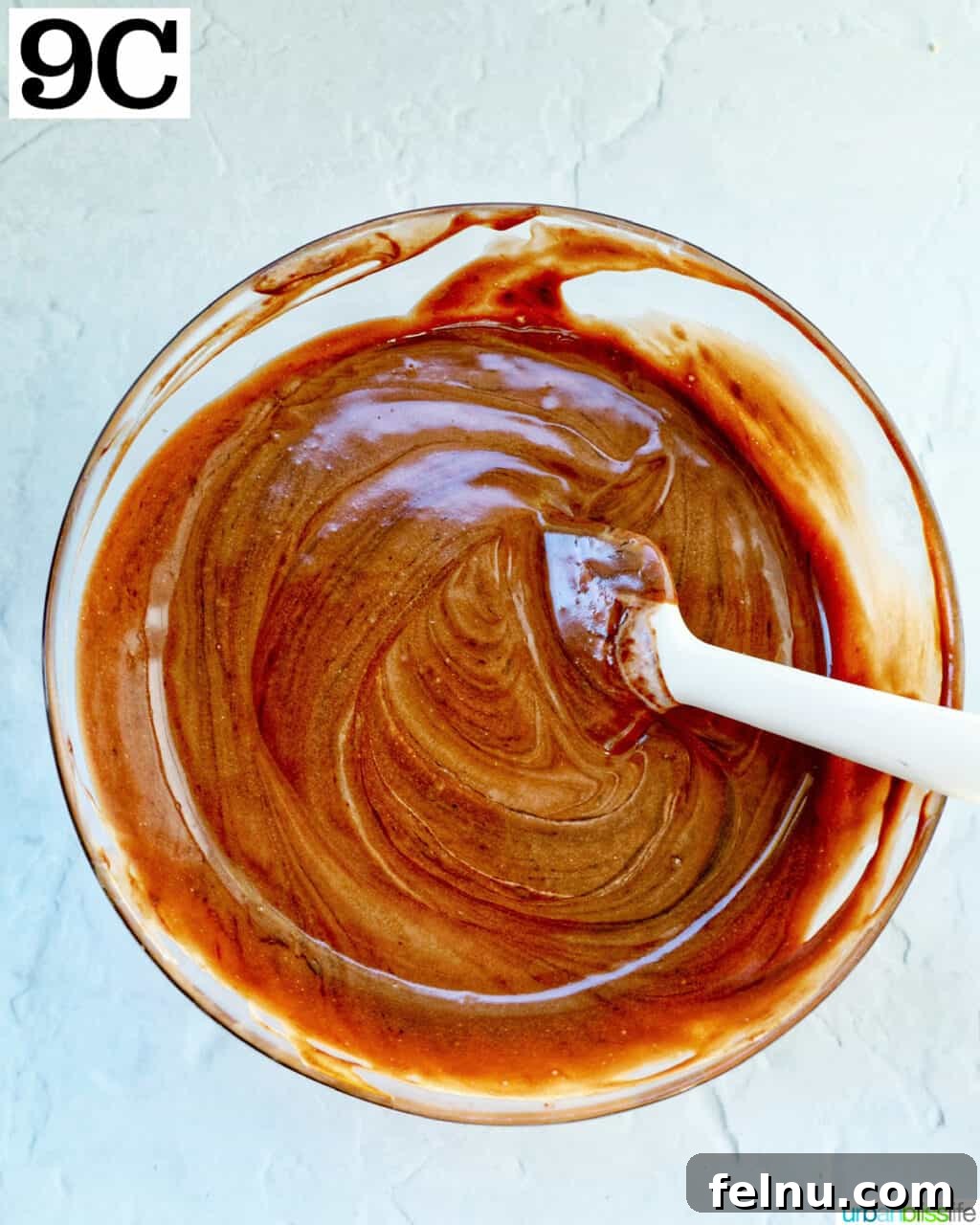 Cool Mint Chocolate Indulgence 15 The finished, smooth, and airy chocolate pie filling mixture in a glass bowl, ready to be poured into the crust.