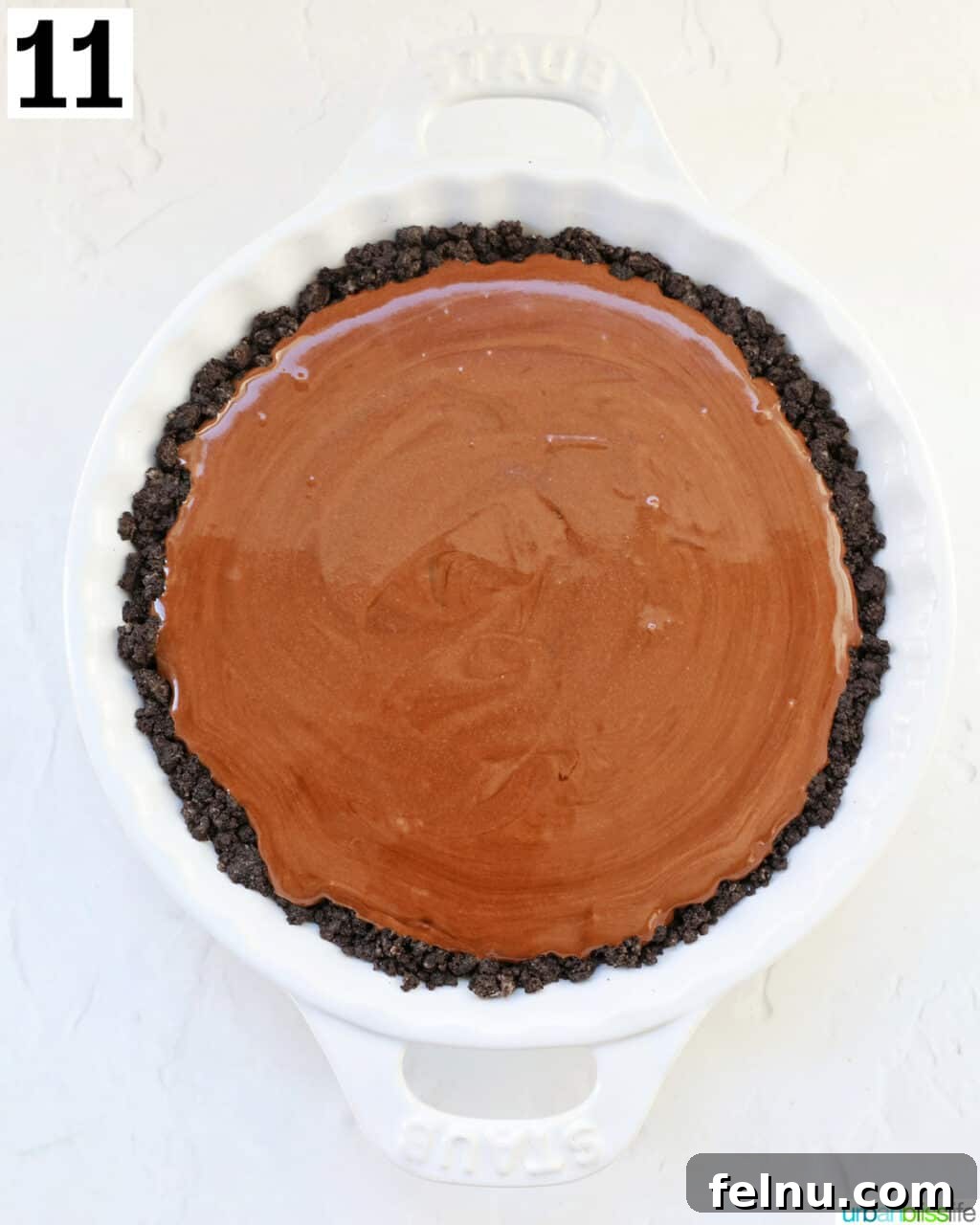 Cool Mint Chocolate Indulgence 17 The chocolate peppermint pie filling beautifully smoothed into the Oreo cookie crust, chilling in a white pie plate.