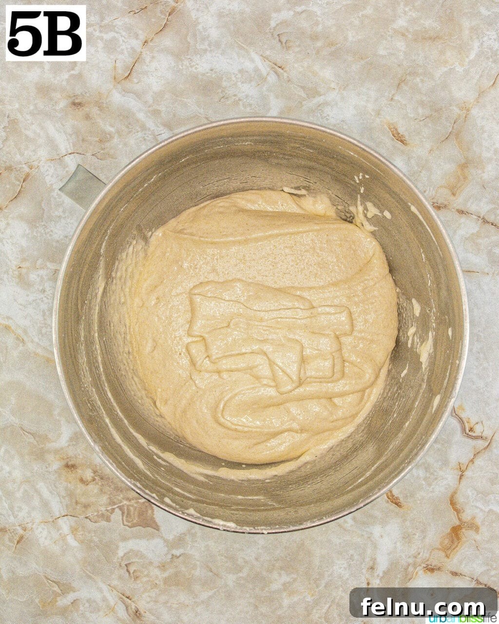Espresso Mascarpone Macarons 11 Stand mixer bowl with macaron batter at the correct 'lava-like' consistency.