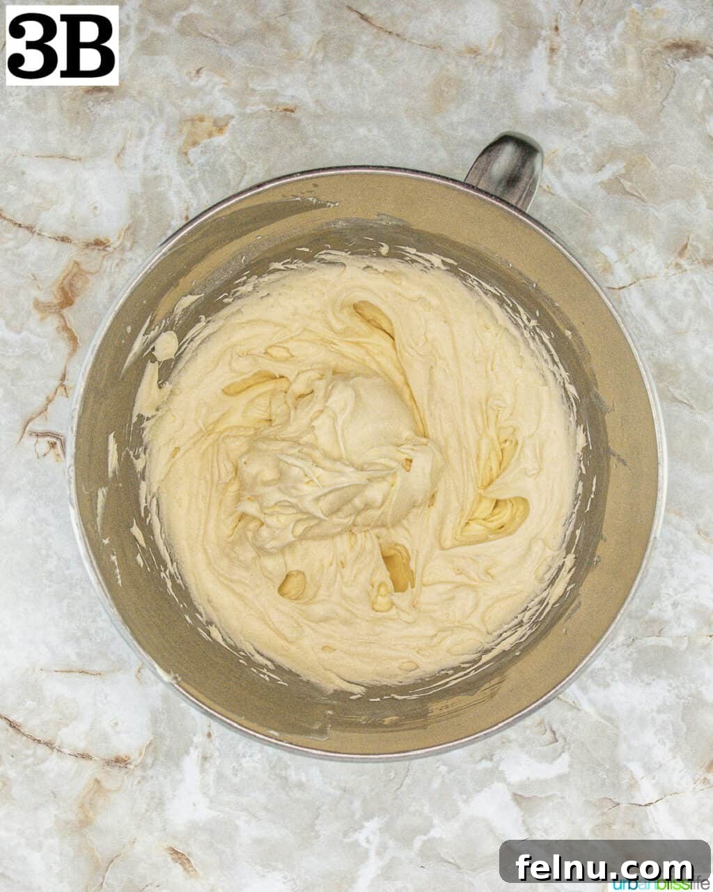 Espresso Mascarpone Macarons 18 Stand mixer bowl with the completed tiramisu filling, smooth and creamy.