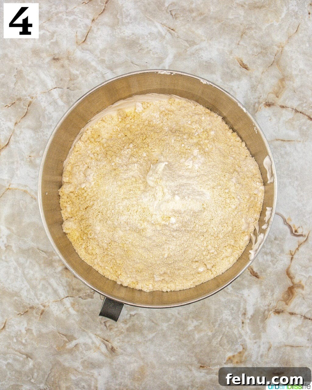 Espresso Mascarpone Macarons 10 Stand mixer bowl with macaron batter being gently folded.