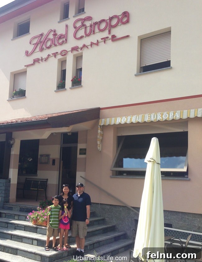 Family outside Hotel Europa, Sorico, Lake Como, Italy