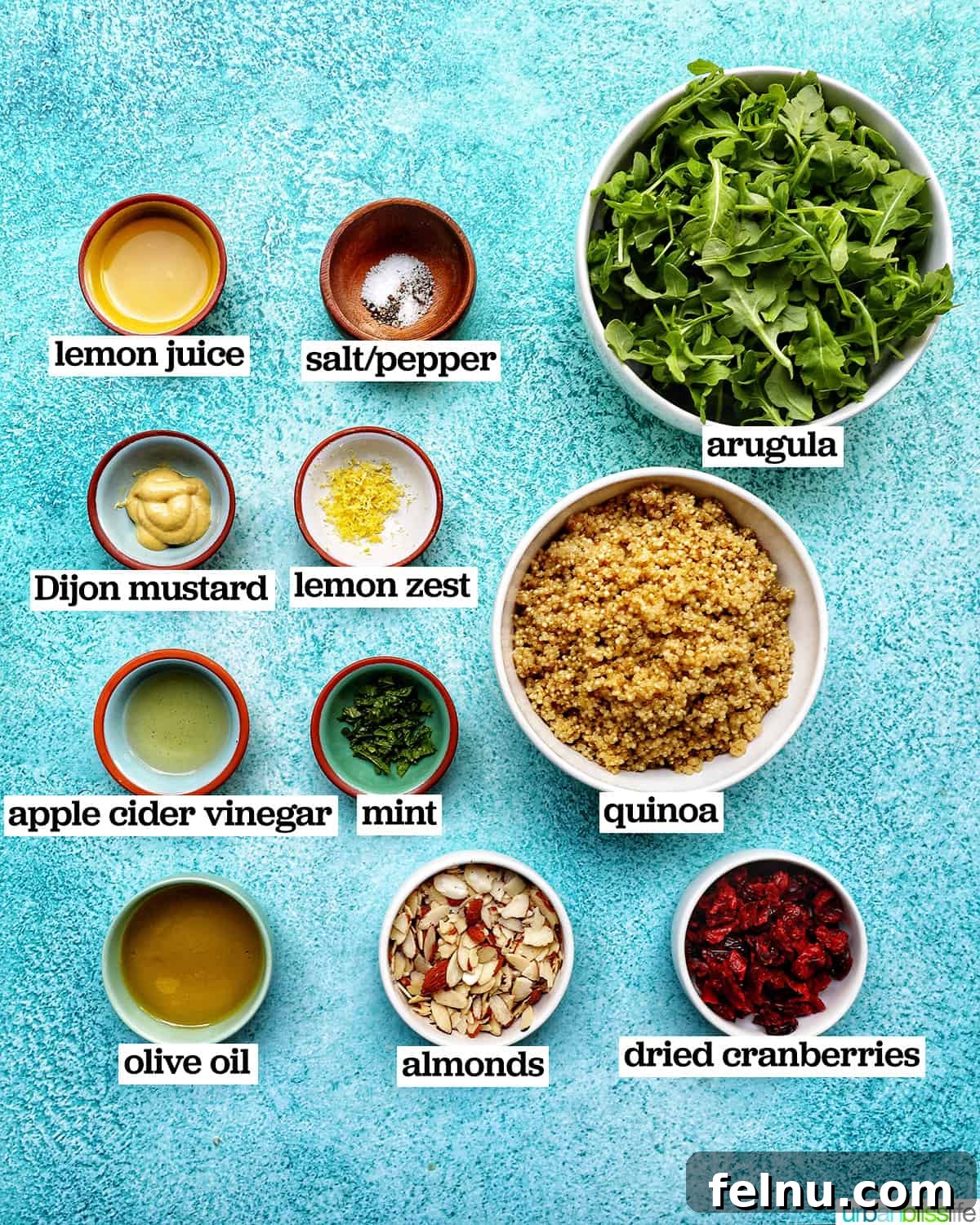 Vibrant Arugula Quinoa Harvest 4 bowls of ingredients to make arugula and quinoa salad.