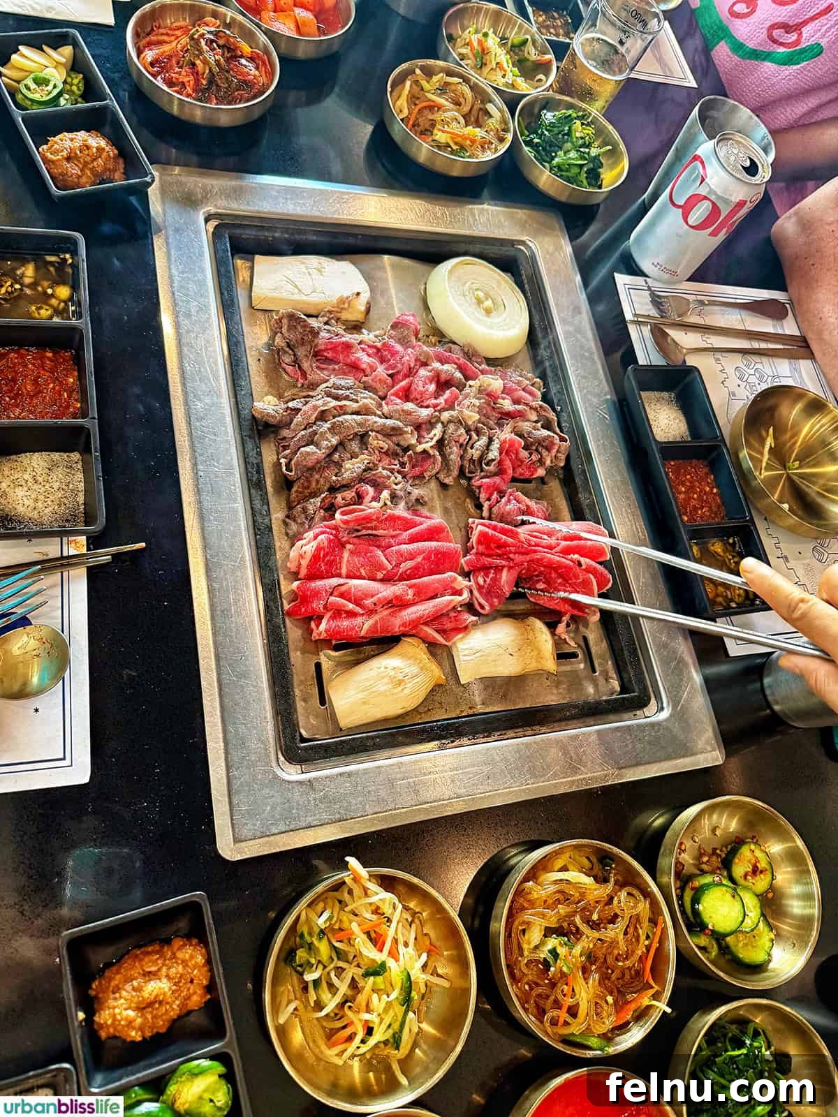 Dining Hotspots in Buena Park 12 A tantalizing display of Korean BBQ meats at Gangnam House in Buena Park, California, highlighting the restaurant's high-quality ingredients and authentic Korean flavors.