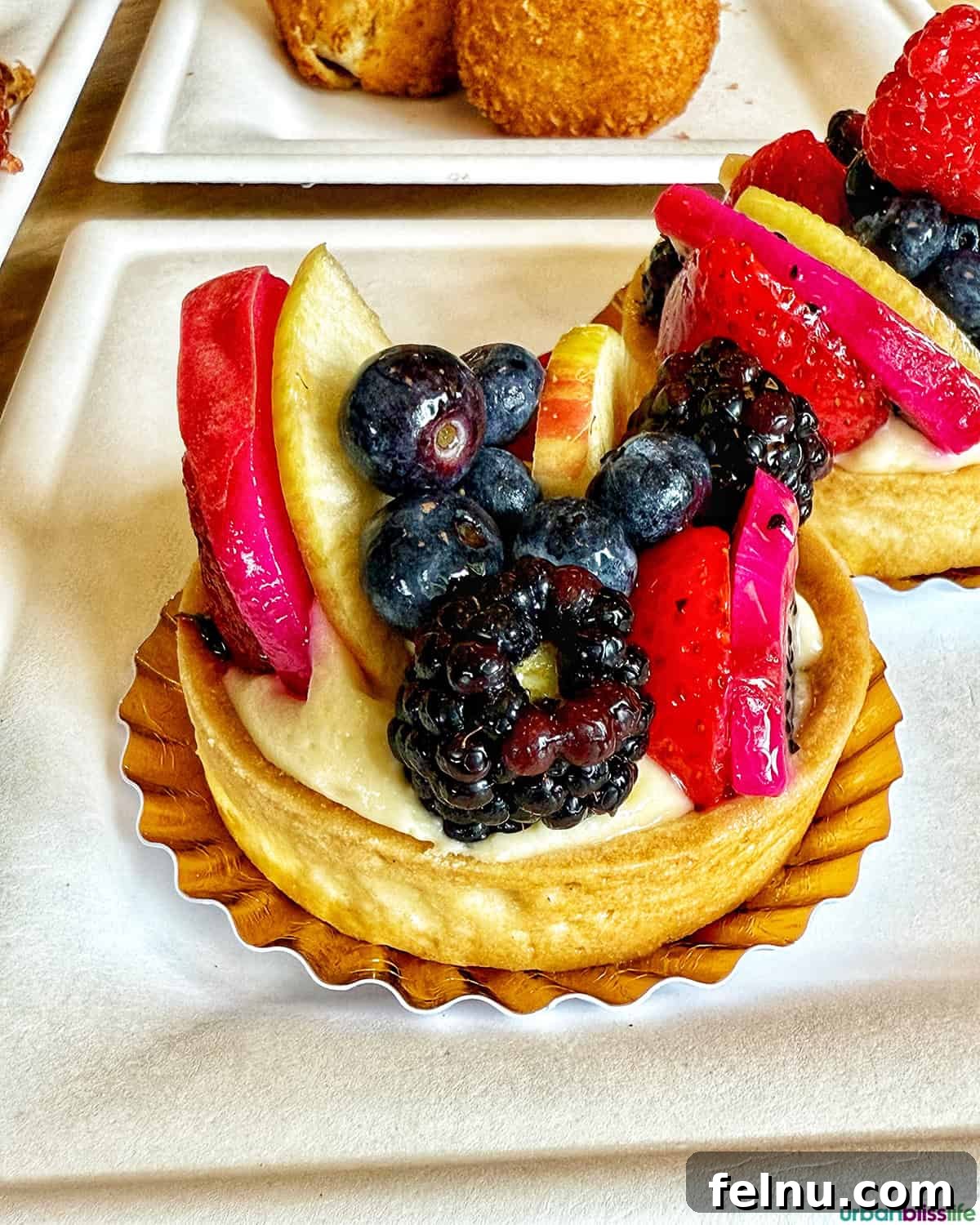 Dining Hotspots in Buena Park 27 A beautiful fruit pastry at Porto's Bakery in Buena Park, California.