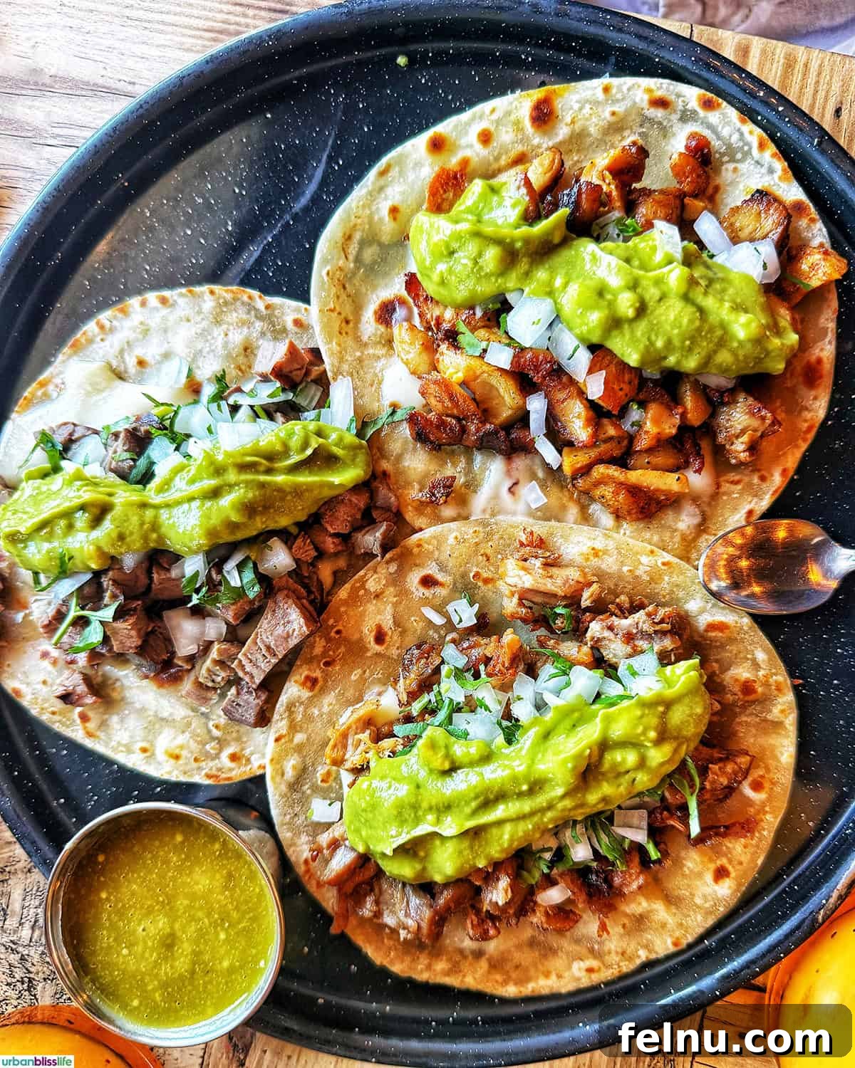 The Ultimate Taco Showdown: Cabo's Best Bites 13 A close-up view of delicious pork and beef tacos at Mother Flower in Cabo San Lucas, Mexico, showcasing the restaurant's meat taco offerings.