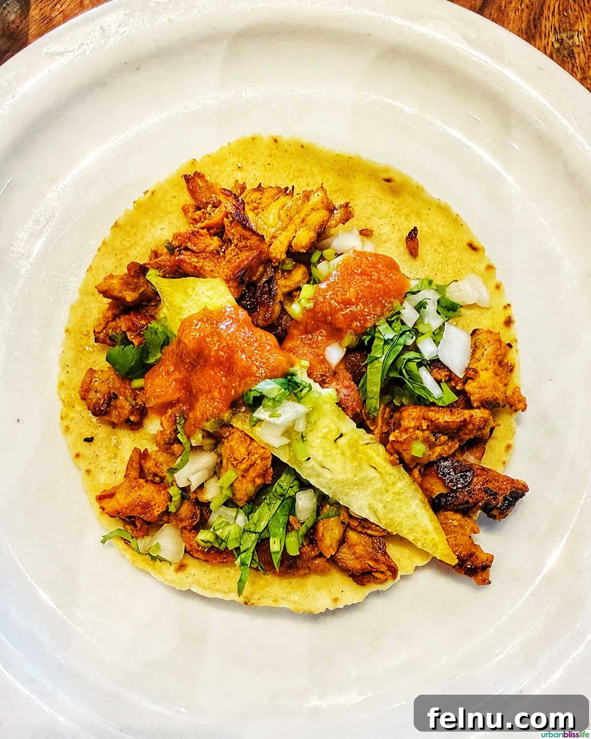 The Ultimate Taco Showdown: Cabo's Best Bites 7 A savory meat taco from El Paisa, a stop on the Juan More Taco food tour in Cabo San Lucas, Mexico.
