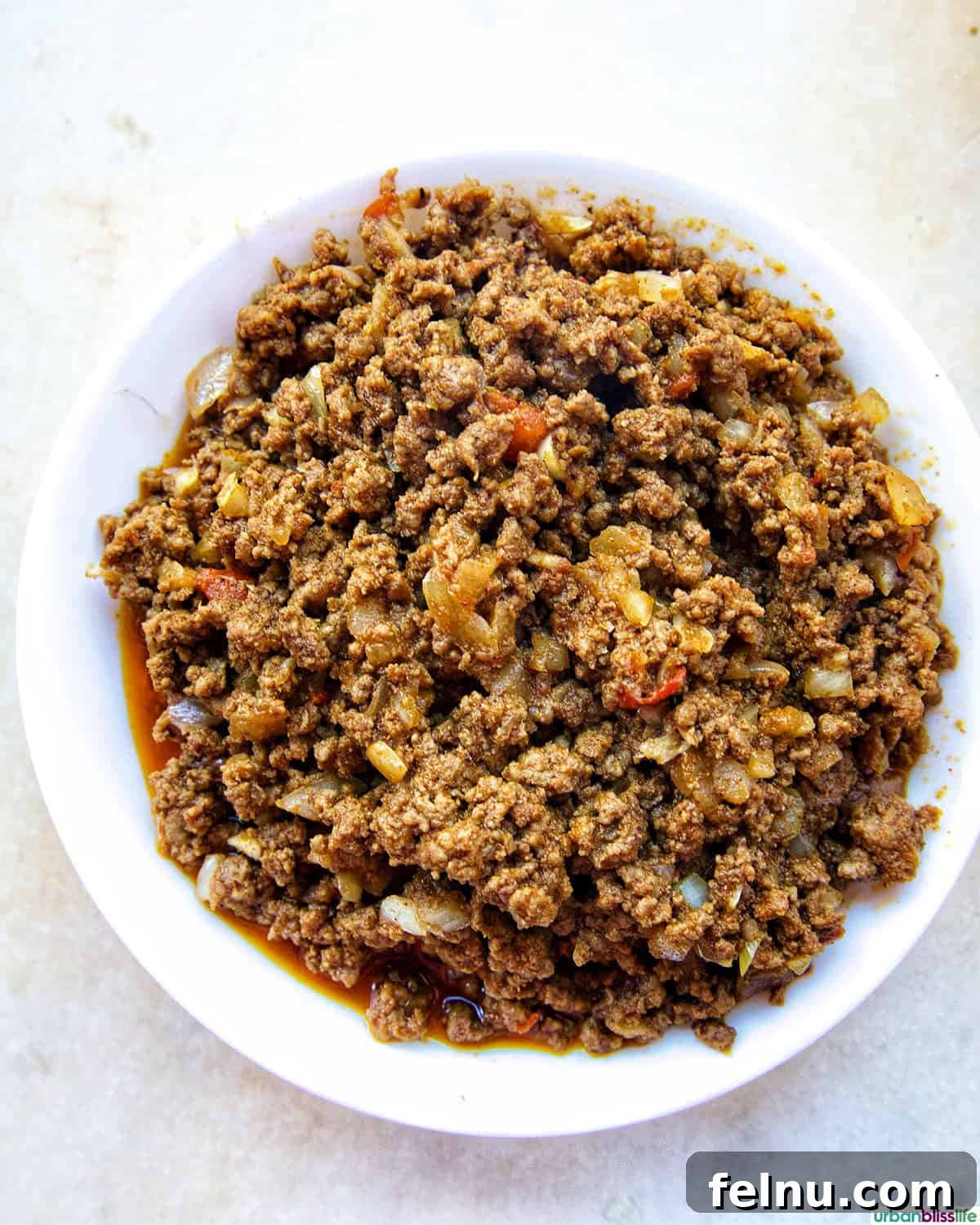 Golden-Crisp Beef Tacos 10 A bowl of seasoned ground beef taco filling, ready for assembly.