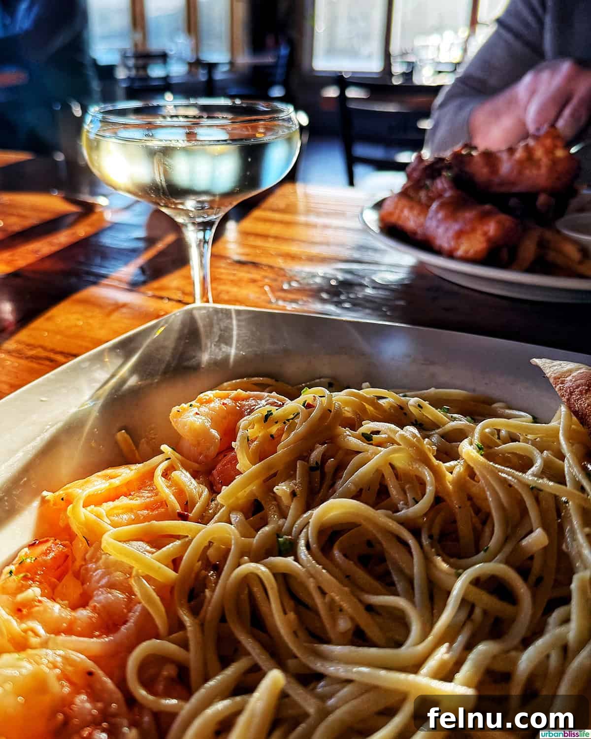 Wine and shrimp scampi dish at Madrona Bar and Grill, Orcas Island.
