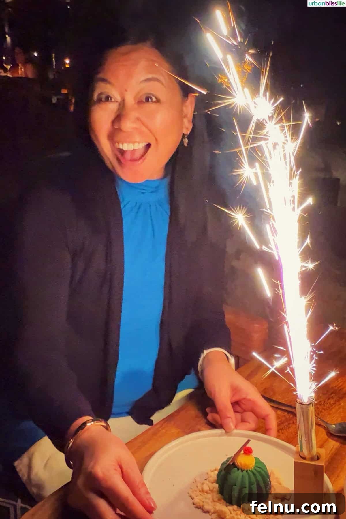 Cocina del Mar: Oceanfront Dining in Cabo San Lucas, Mexico 12 Marlynn Jayme Schotland with fireworks birthday dessert at Cocina del Mar restaurant in Cabo San Lucas, Mexico.