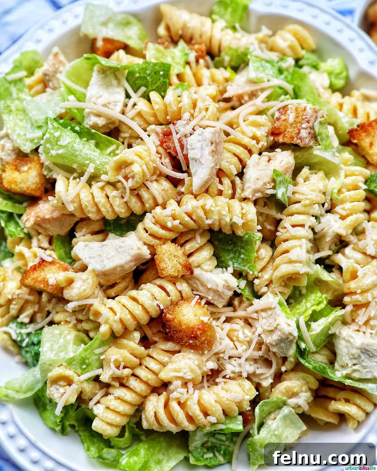 Creamy Caesar Pasta Salad with Crispy Croutons 2 bowl of Caesar pasta salad.
