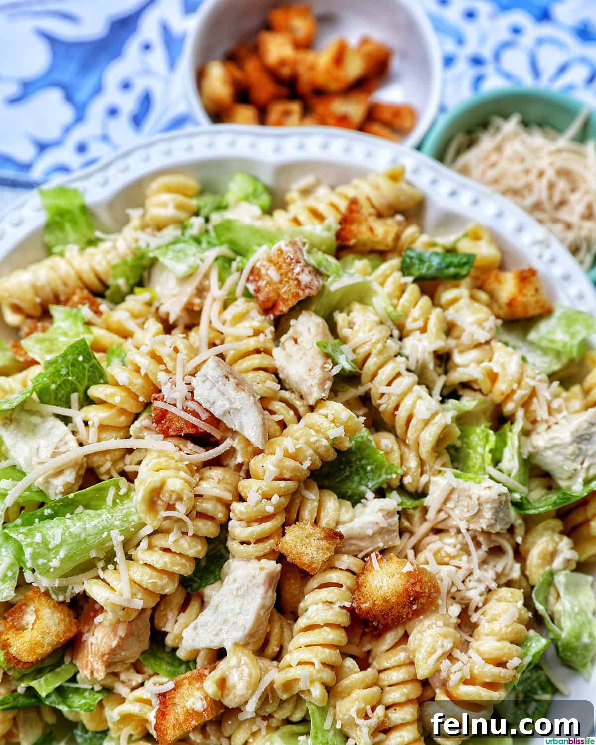 Creamy Caesar Pasta Salad with Crispy Croutons 3 bowl of Caesar pasta salad.