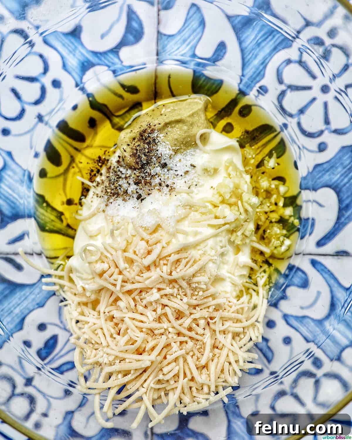 Creamy Caesar Pasta Salad with Crispy Croutons 7 ingredients to make Caesar dressing in a bowl.