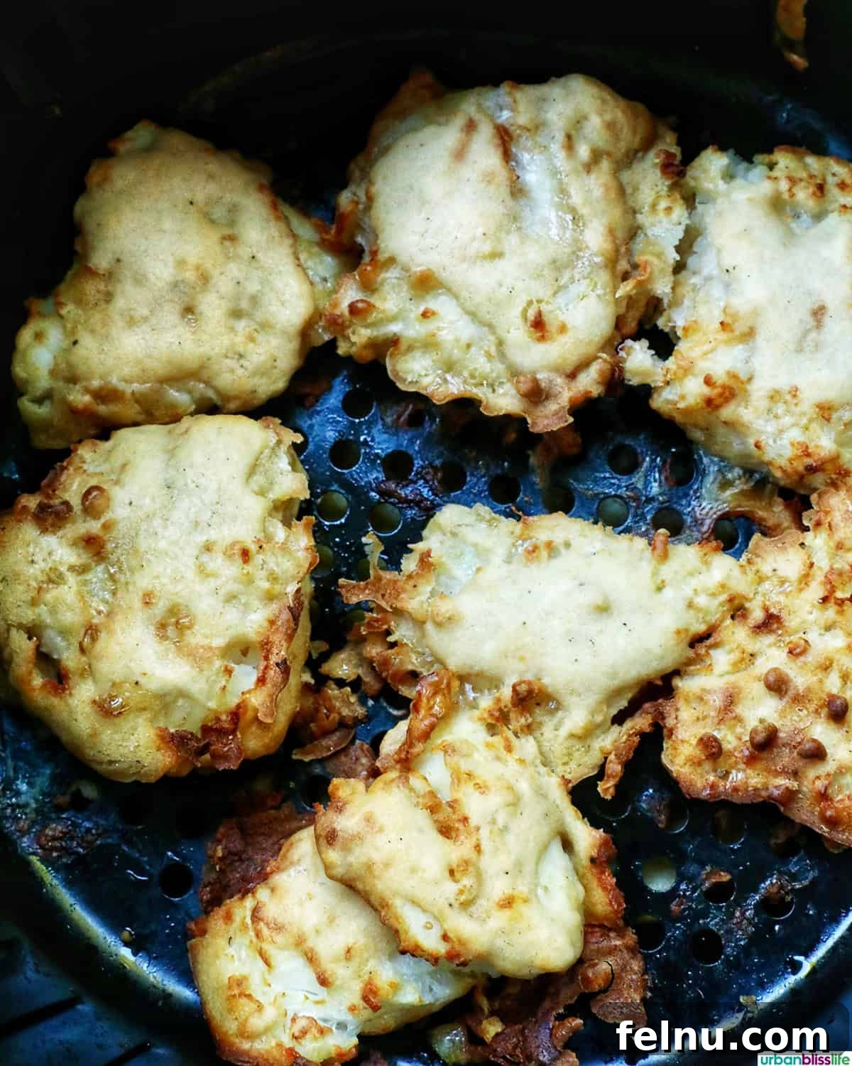 Crispy Air Fryer Cod with Lemon Garlic Butter 10 beer battered fish in the air fryer.