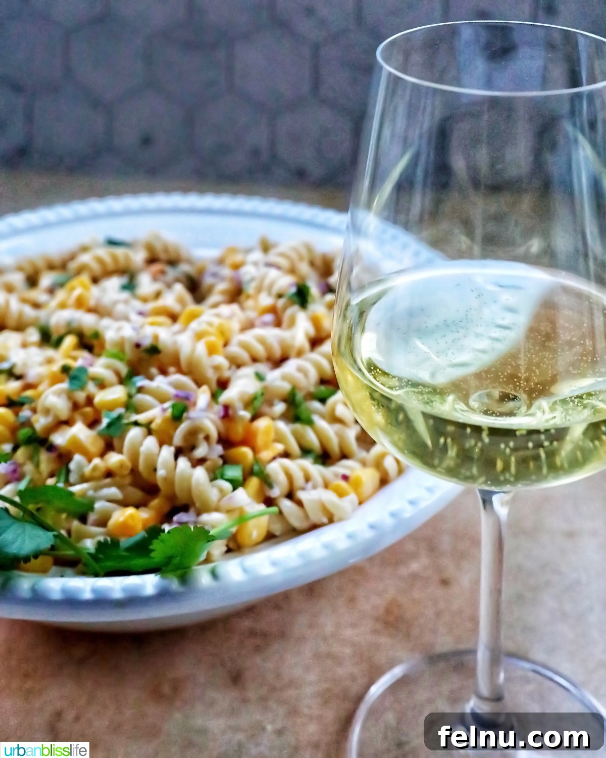 Creamy Instant Pot Mexican Corn Chowder 12 Mexican street corn pasta salad with a glass of white wine.